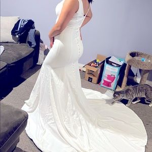 trumpet/mermaid stretch crepe V-neck ruffles sleeveless wedding dress